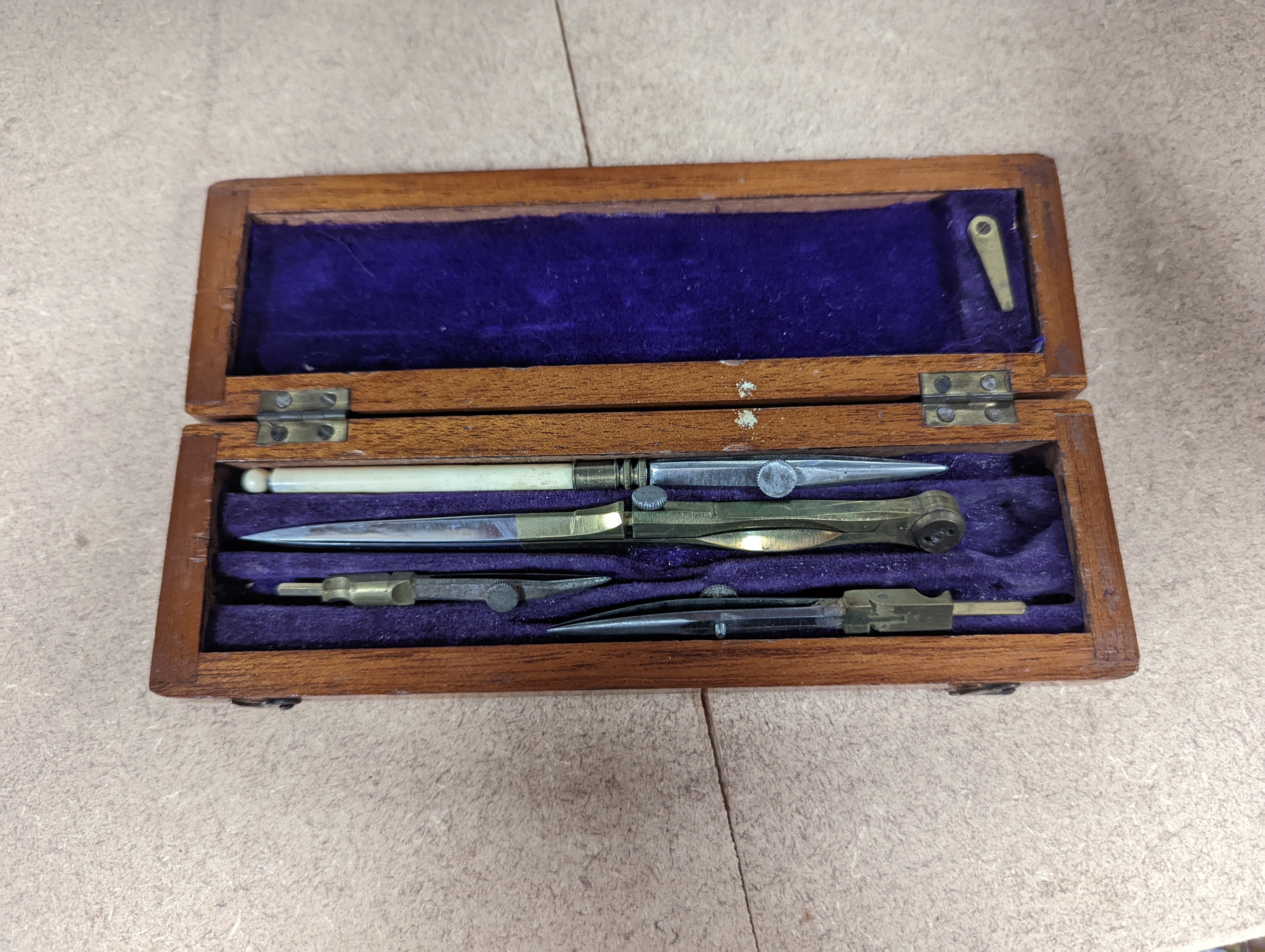 A collection of mahogany cased drawing instruments (8)